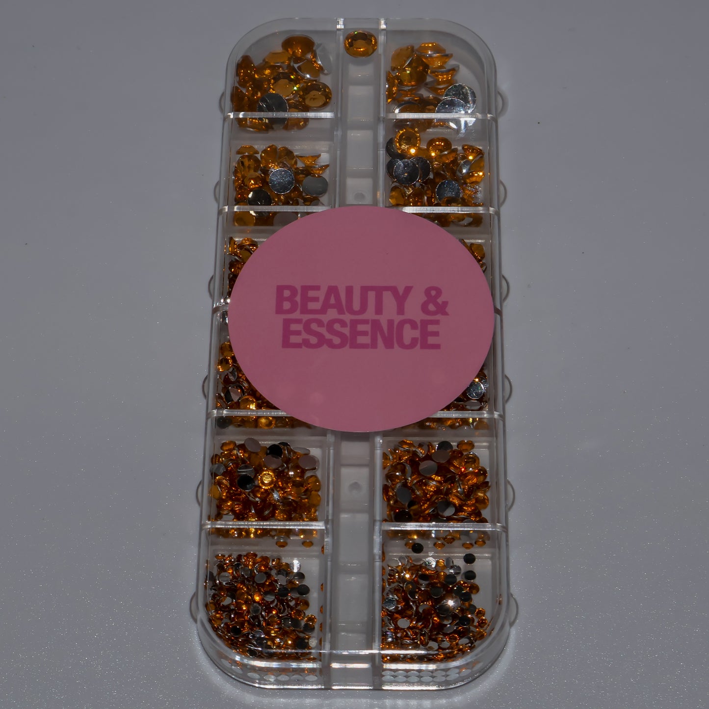 Diamantes de imitación dorados