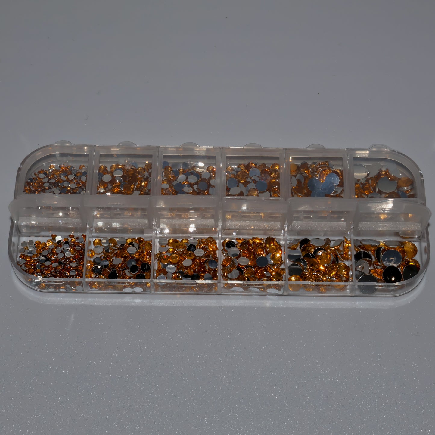 Diamantes de imitación dorados