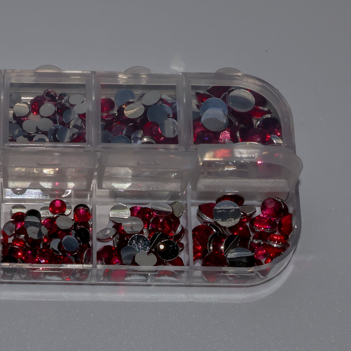 Diamantes de imitación de color rosa oscuro