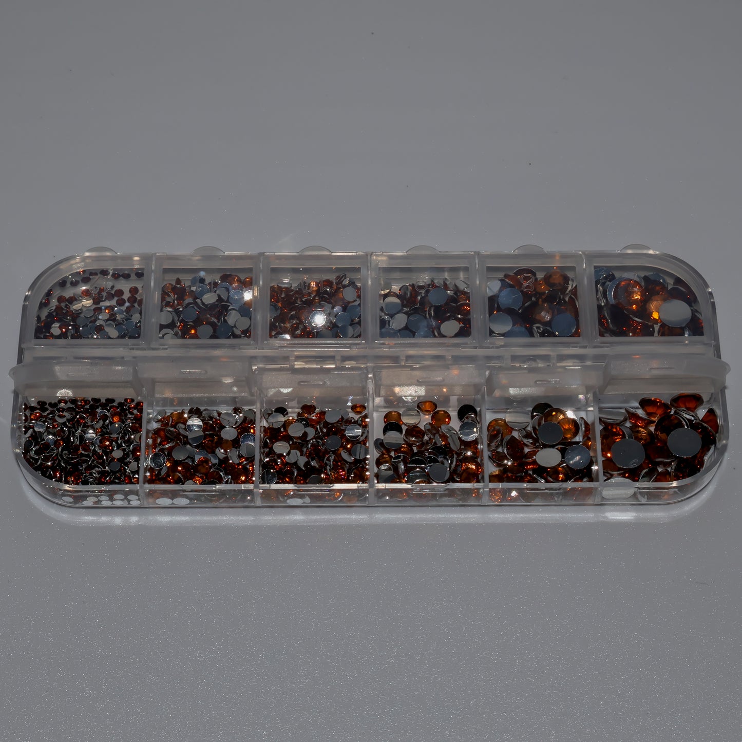 Diamantes de imitación marrones