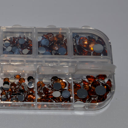 Diamantes de imitación marrones