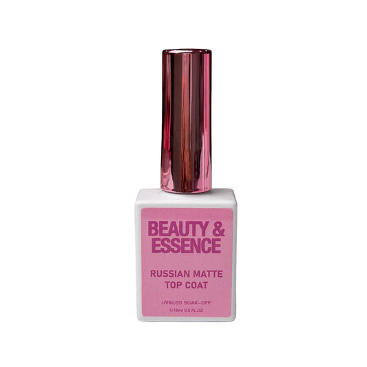 Beauty & Essence Russian Matte top coat bottle on a white surface with a blurred background